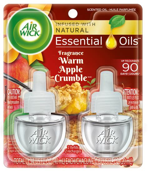 Air Wick Spread the Joy Warm Apple Crumble Scented Oil logo