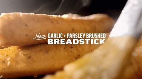 Applebee's Garlic + Parsley Brushed Breadstick logo
