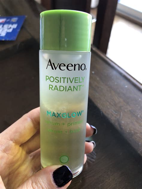 Aveeno Positively Radiant Maxglow Serum + Primer logo
