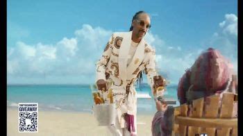 Corona TV Spot, 'Triptocurrency Giveaway' Ft. Bad Bunny, Snoop Dogg featuring Snoop Dogg