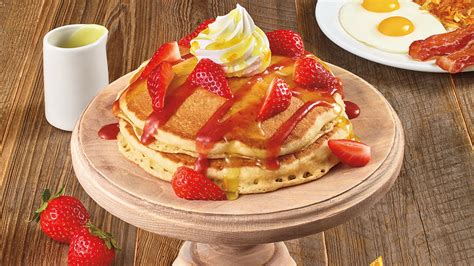 Denny's Strawberries & Cream Pancake Breakfast logo