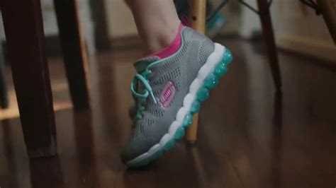 Famous Footwear TV Commercial For New Balance Smiley Face created for Famous Footwear