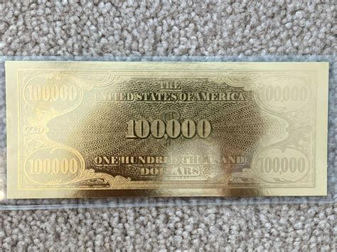 National Collector's Mint $100,000 Gold Certificate Tribute logo