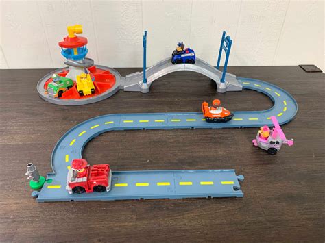 PAW Patrol Paw Patrol Launch n Roll Lookout Tower Track Set logo