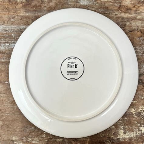 Pier 1 Imports All Spruced Up Salad Plate logo