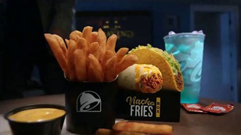 Taco Bell $5 Nacho Fries Box TV Spot, 'Can't Escape the Cravings' Featuring Joe Keery featuring Sarah Hyland