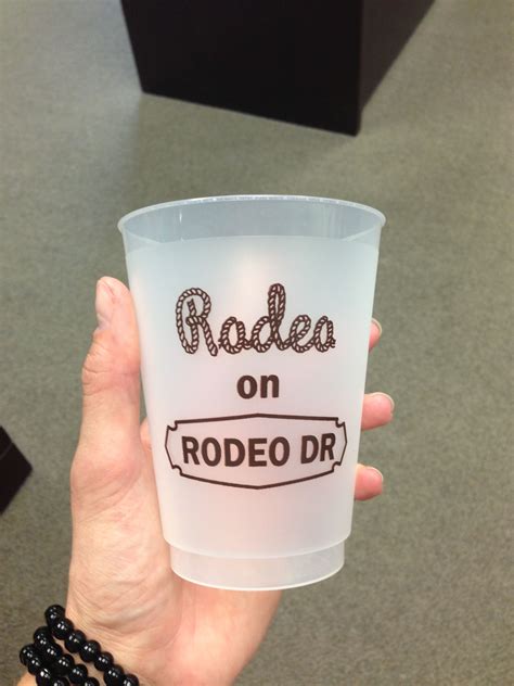 The American Rodeo Rodeo Shooter Red Shot Glass logo