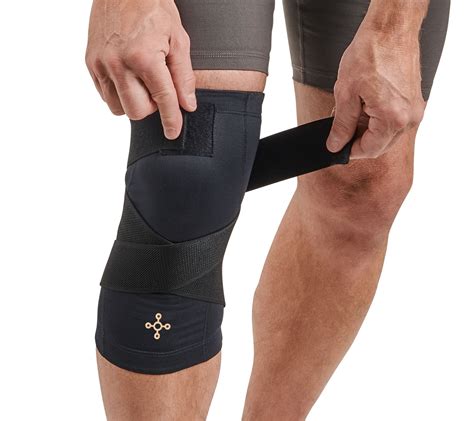 Tommie Copper Pro-Grade Adjustable Support Compression Knee Sleeve logo