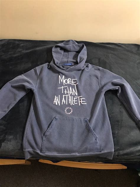 Uninterrupted More Than An Athlete Hoodie logo